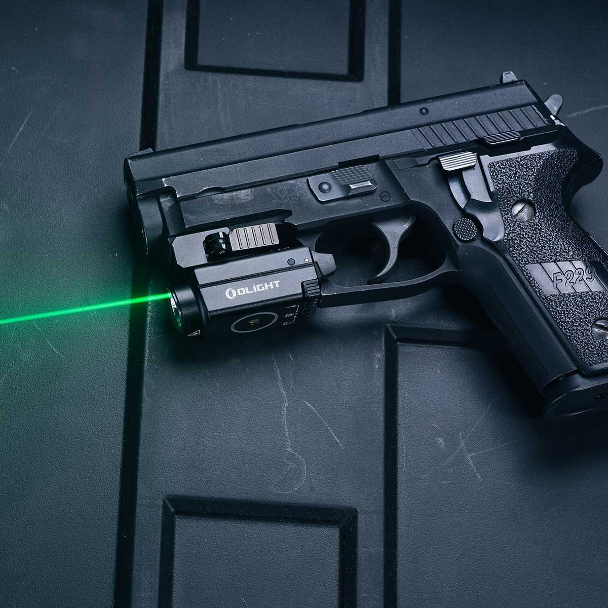 Latarka na broń z celownikiem laserowym Olight BALDR S - 800 lumenów, Green Laser