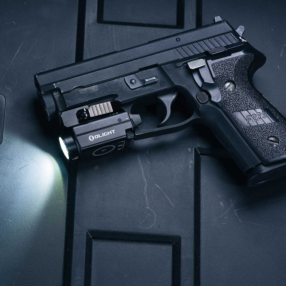 Latarka na broń z celownikiem laserowym Olight BALDR S - 800 lumenów, Green Laser