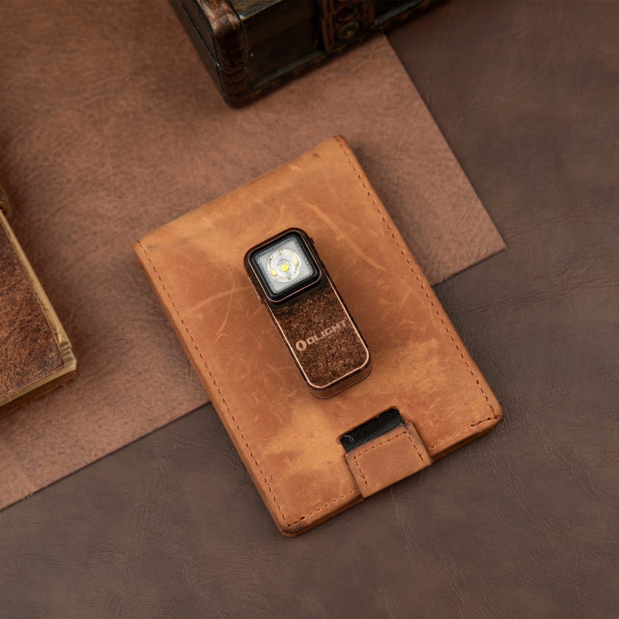 Акумуляторний ліхтарик Olight Oclip Copper - 300 люменів