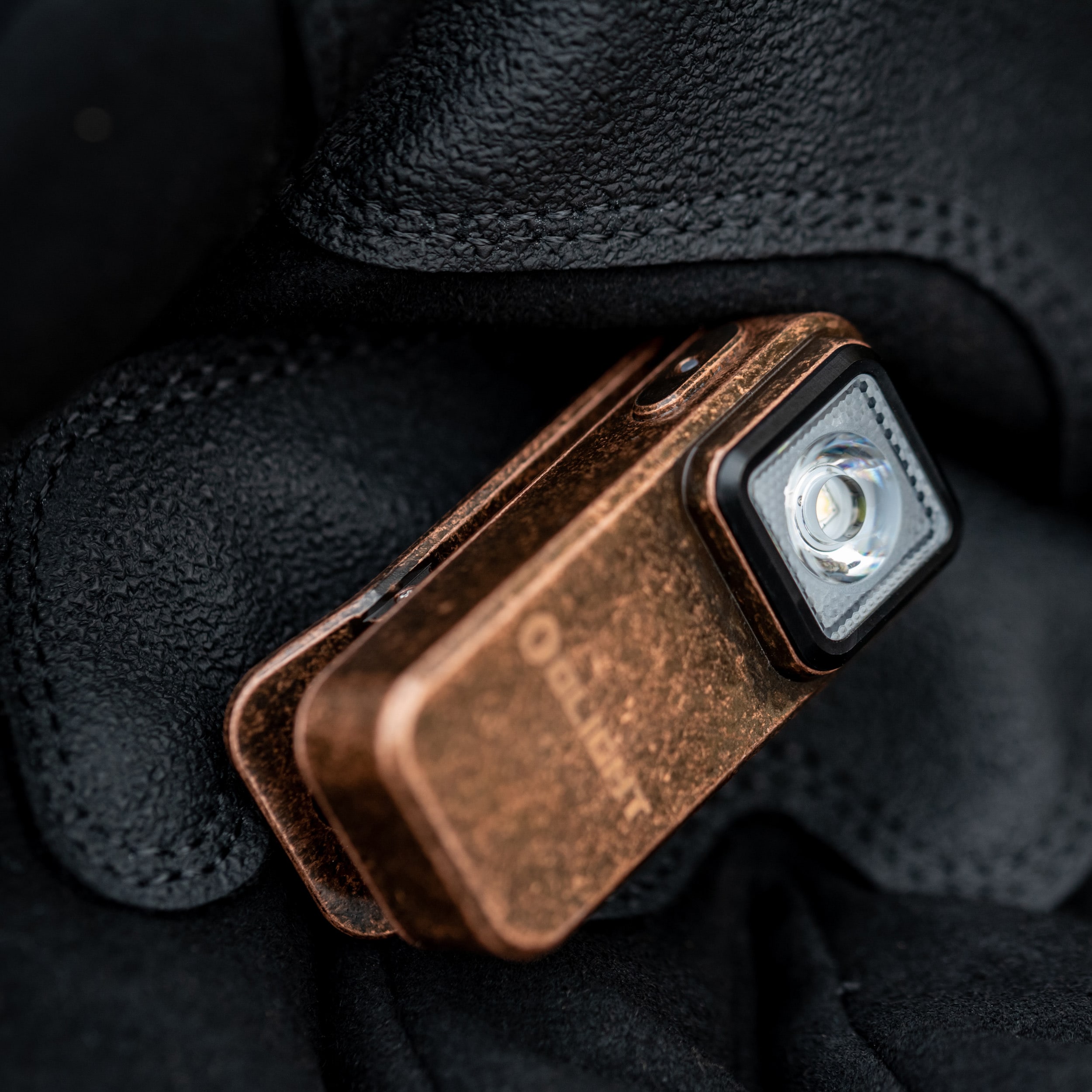 Акумуляторний ліхтарик Olight Oclip Copper - 300 люменів