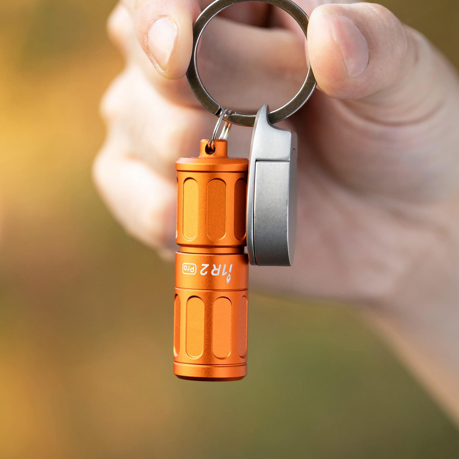 Latarka Olight I1R 2 Pro Capsule Orange - 180 lumenów