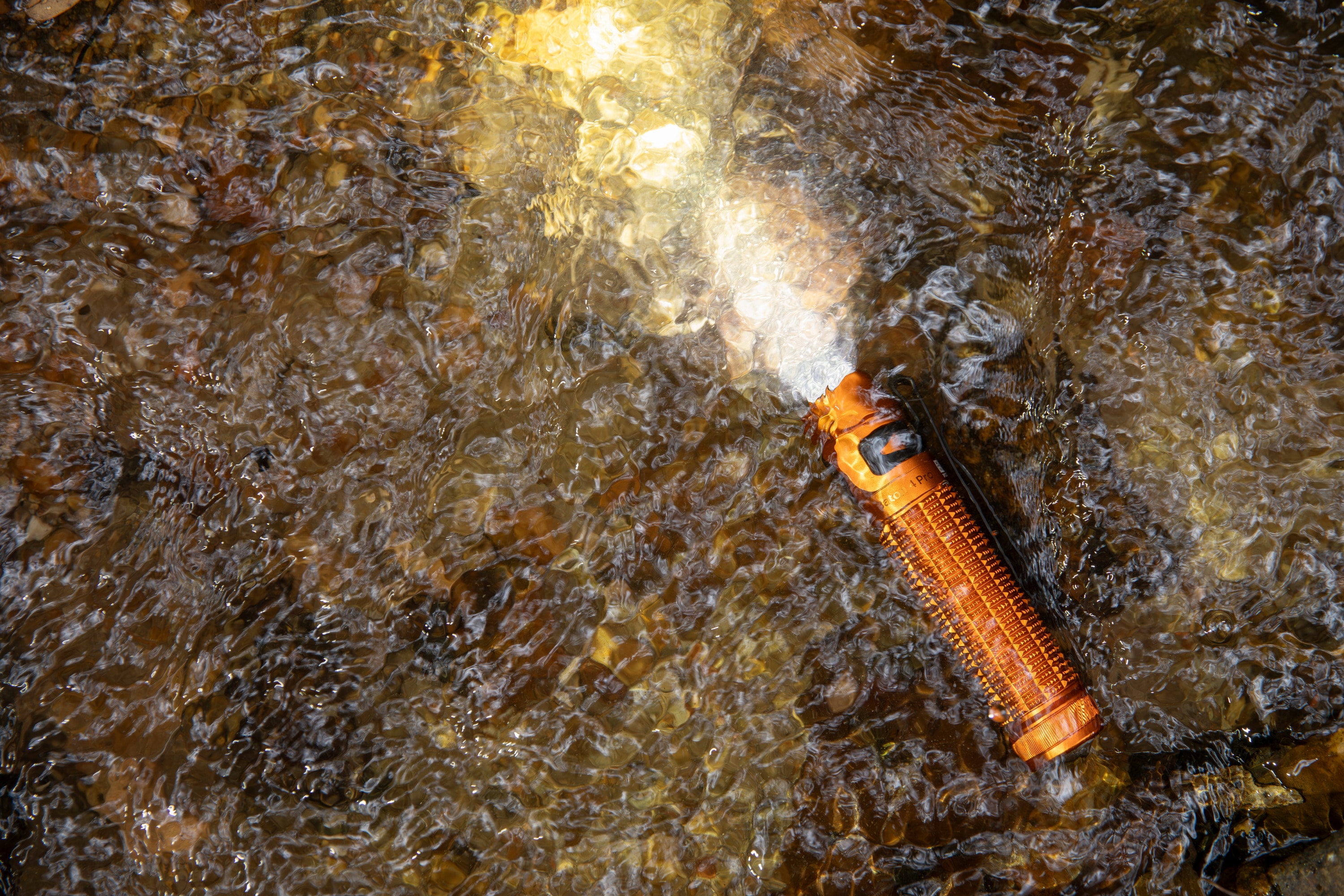 Latarka Olight Baton 4 Pro Orange - 1600 lumenów