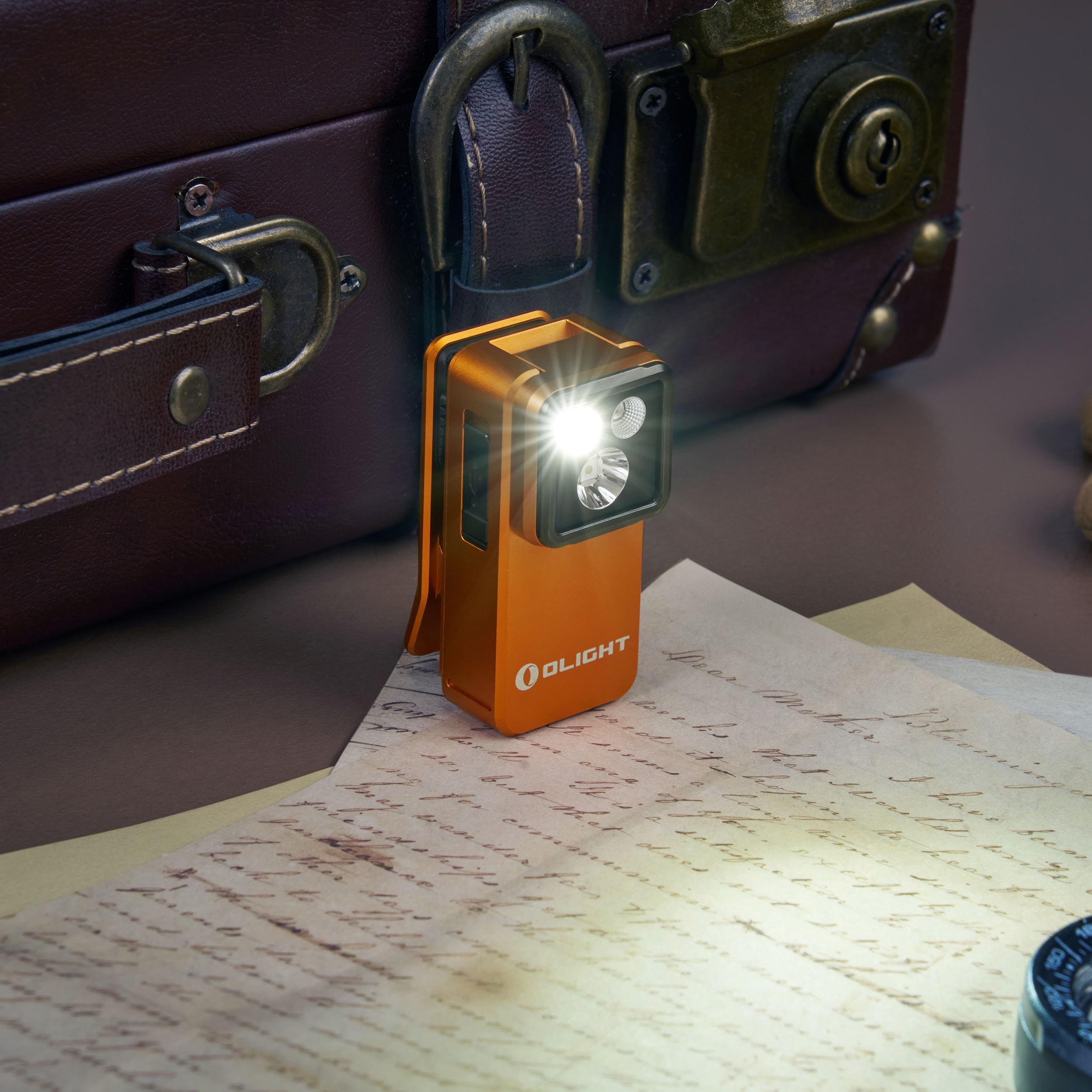 Latarka akumulatorowa Olight Oclip 2 Pro Premium Orange - 530 lumenów