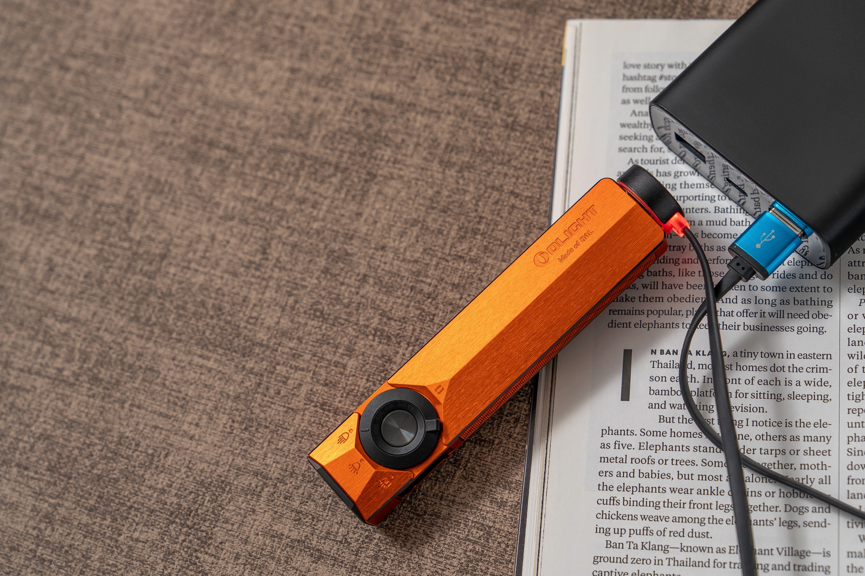Latarka Olight ArkPro Ultra Class 1 Cool White Amber Orange - 1700 lumenów
