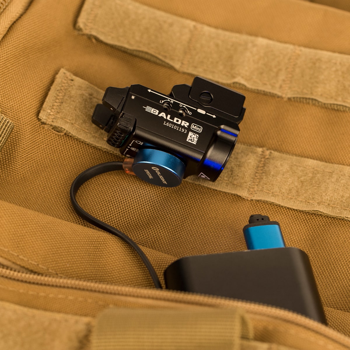 Latarka na broń z celownikiem laserowym Olight BALDR Mini - 600 lumenów, Green Laser