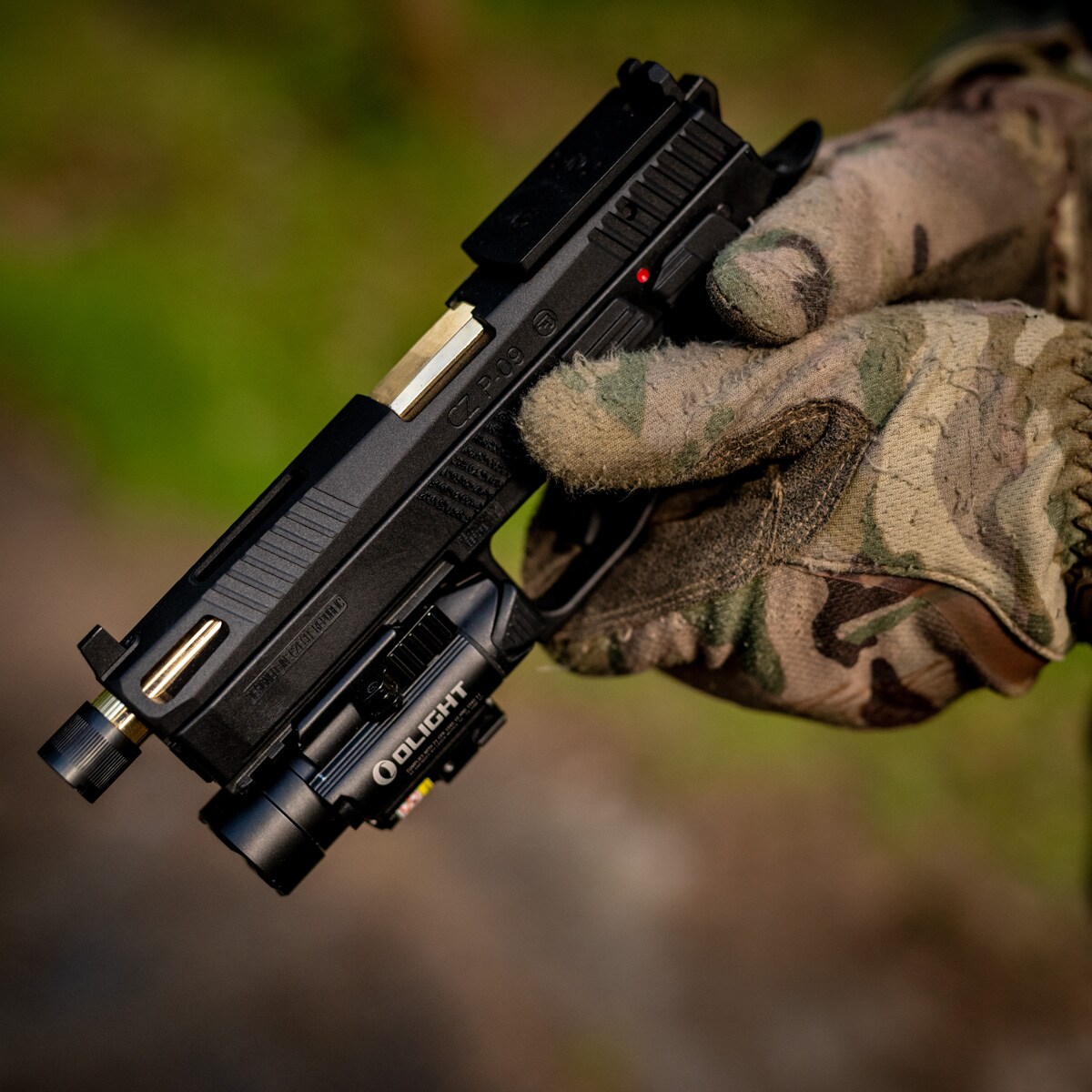 Latarka z celownikiem laserowym Olight BALDR IR - 1350 lumenów