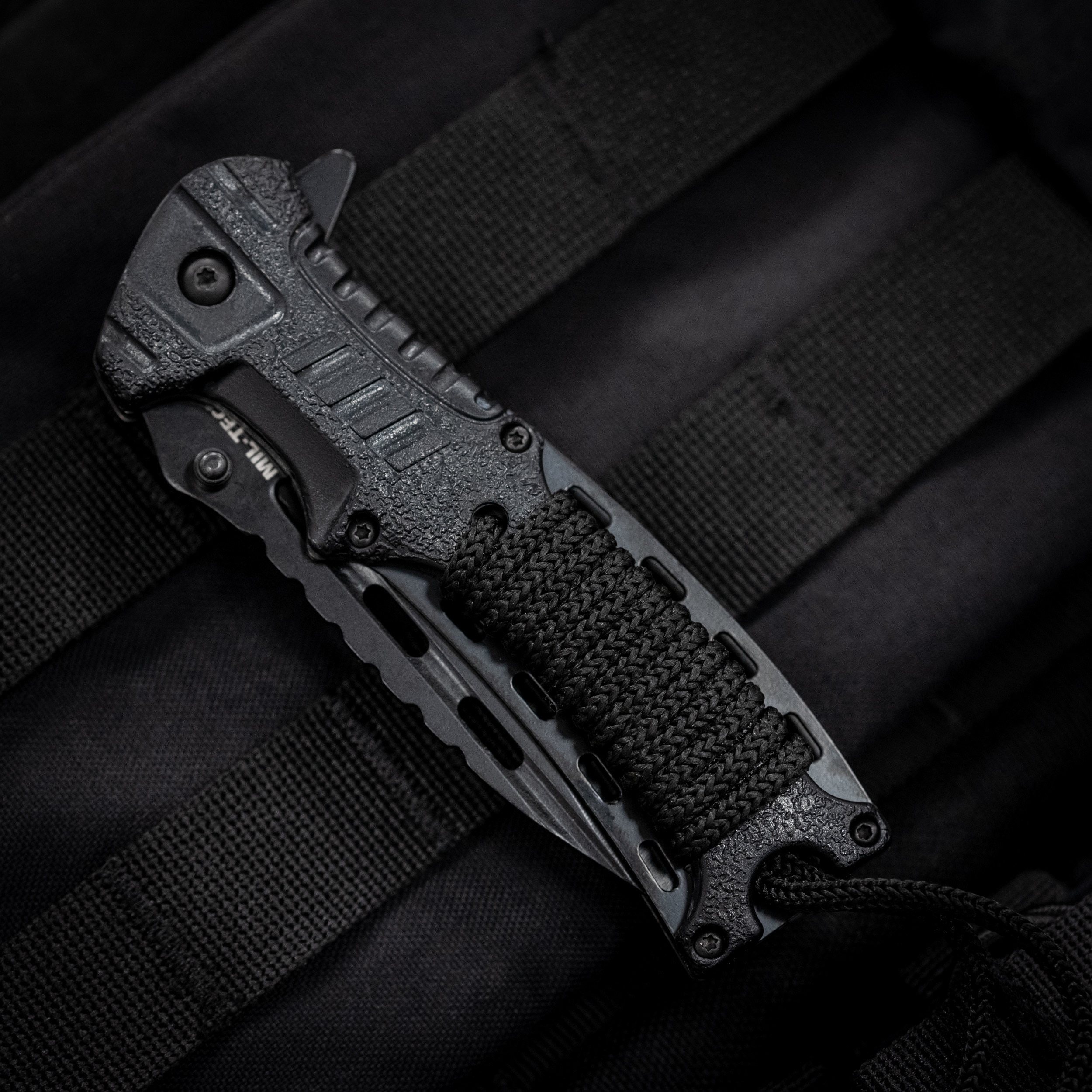 Nóż składany Mil-Tec Paracord z krzesiwem - Black