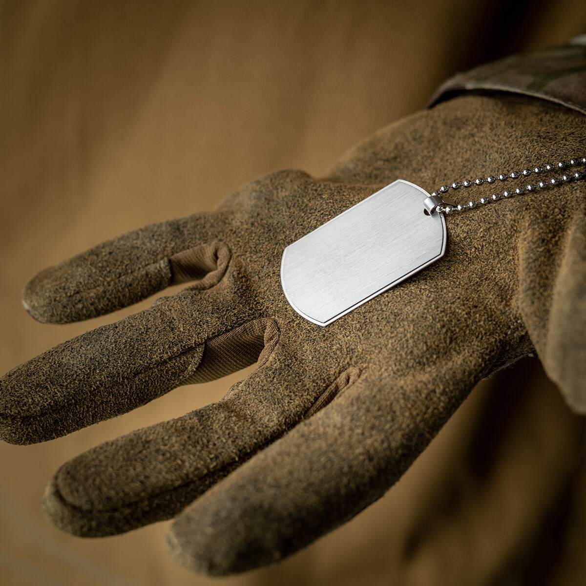 Титановий жетон 30x50 мм з обідком - з можливістю гравіювання