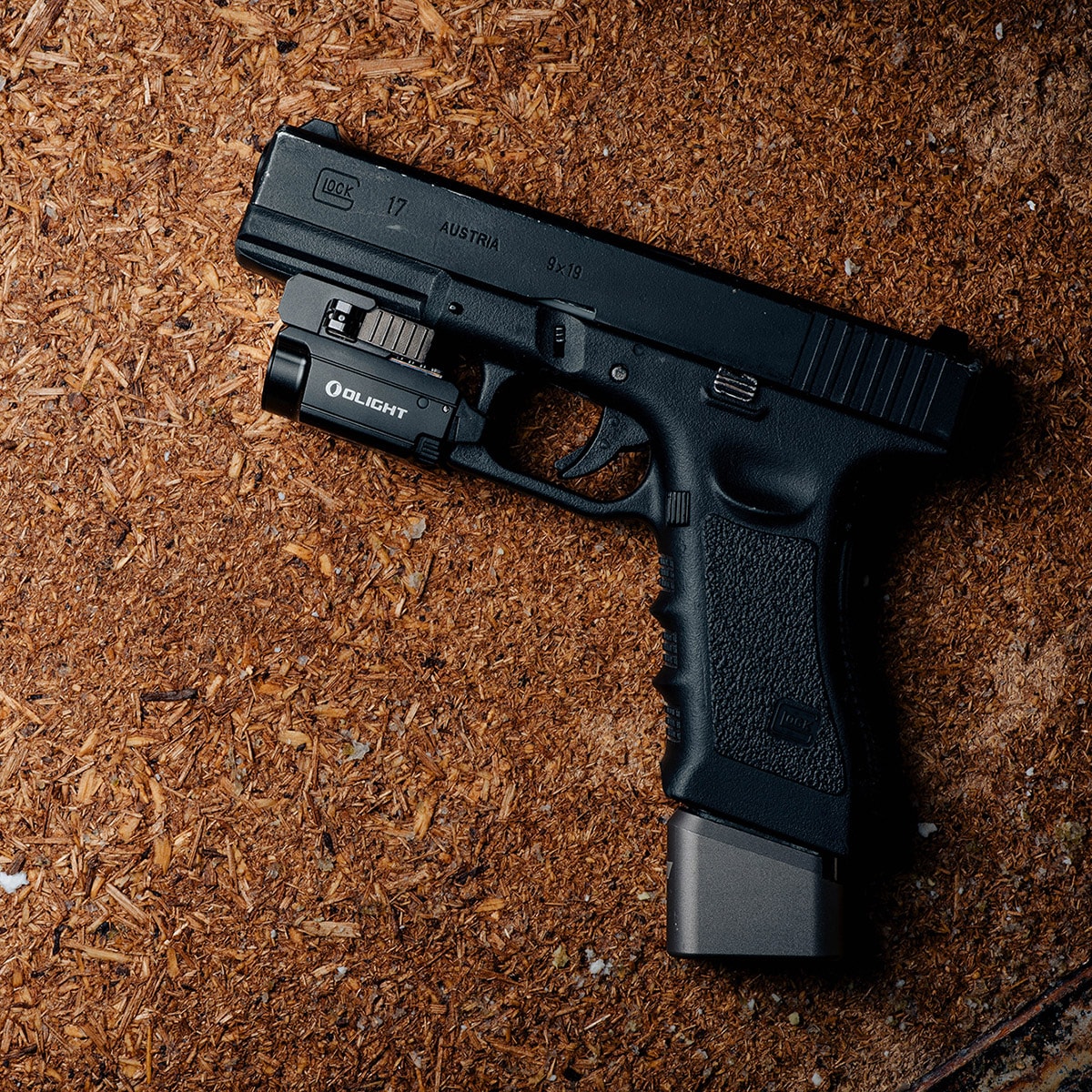 Ліхтарик для зброї з лазерним прицілом Olight BALDR Mini RL - 600 люменів, Red Laser