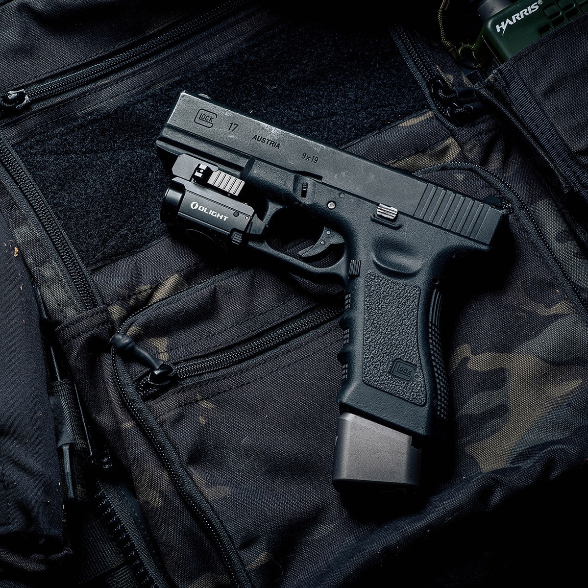 Ліхтарик для зброї з лазерним прицілом Olight BALDR Mini RL - 600 люменів, Red Laser