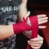 Bandaże bokserskie DBX Bushido na dłonie i nadgarstki 2 x 4 m - Czerwone