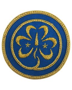 Emblemat Światowego Stowarzyszenia Przewodniczek i Skautek - WAGGGS