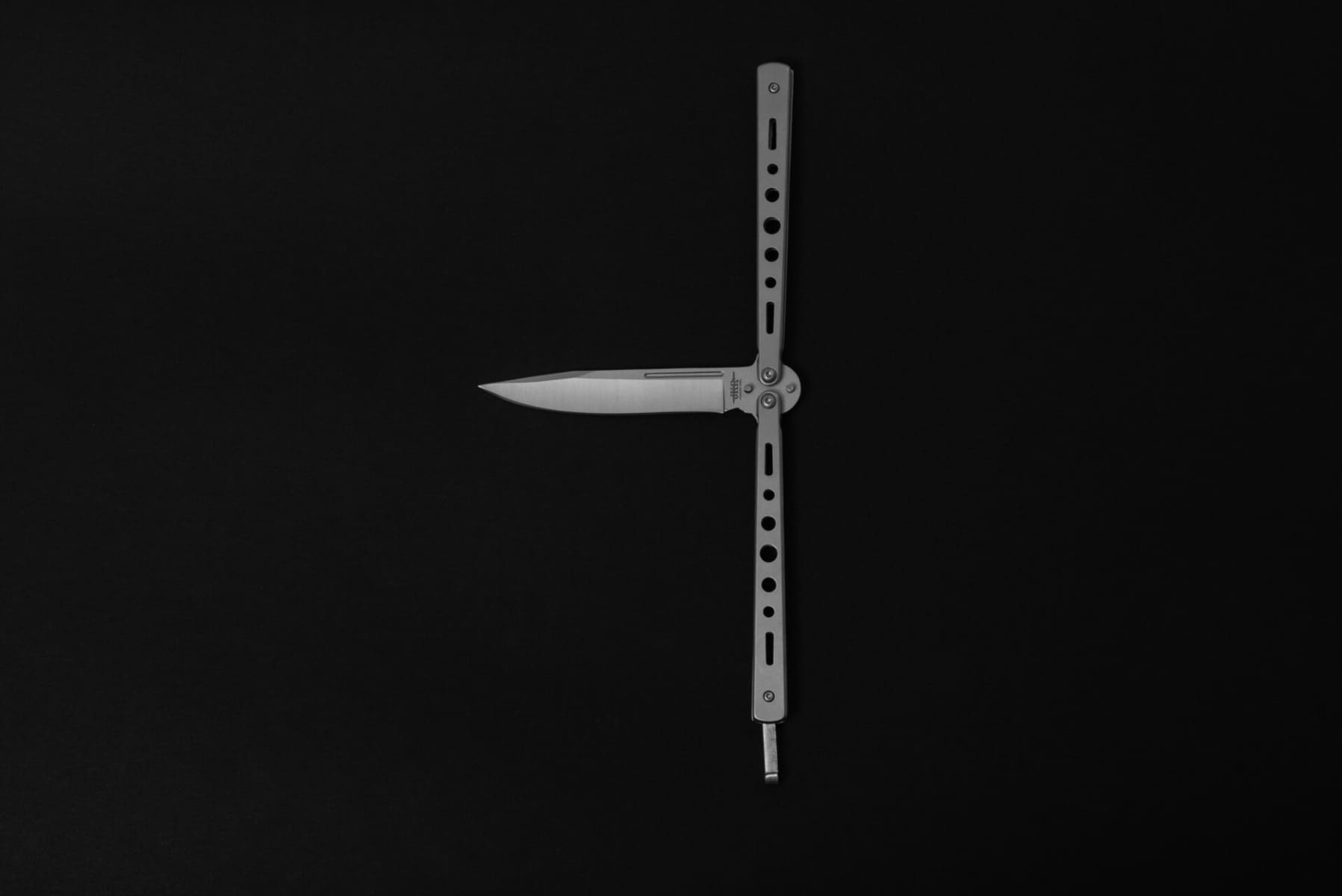 Butterfly knife (balisong) in the open position